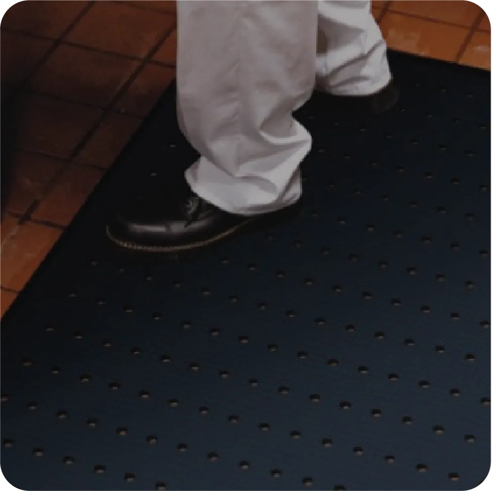 person standing on a floor mat