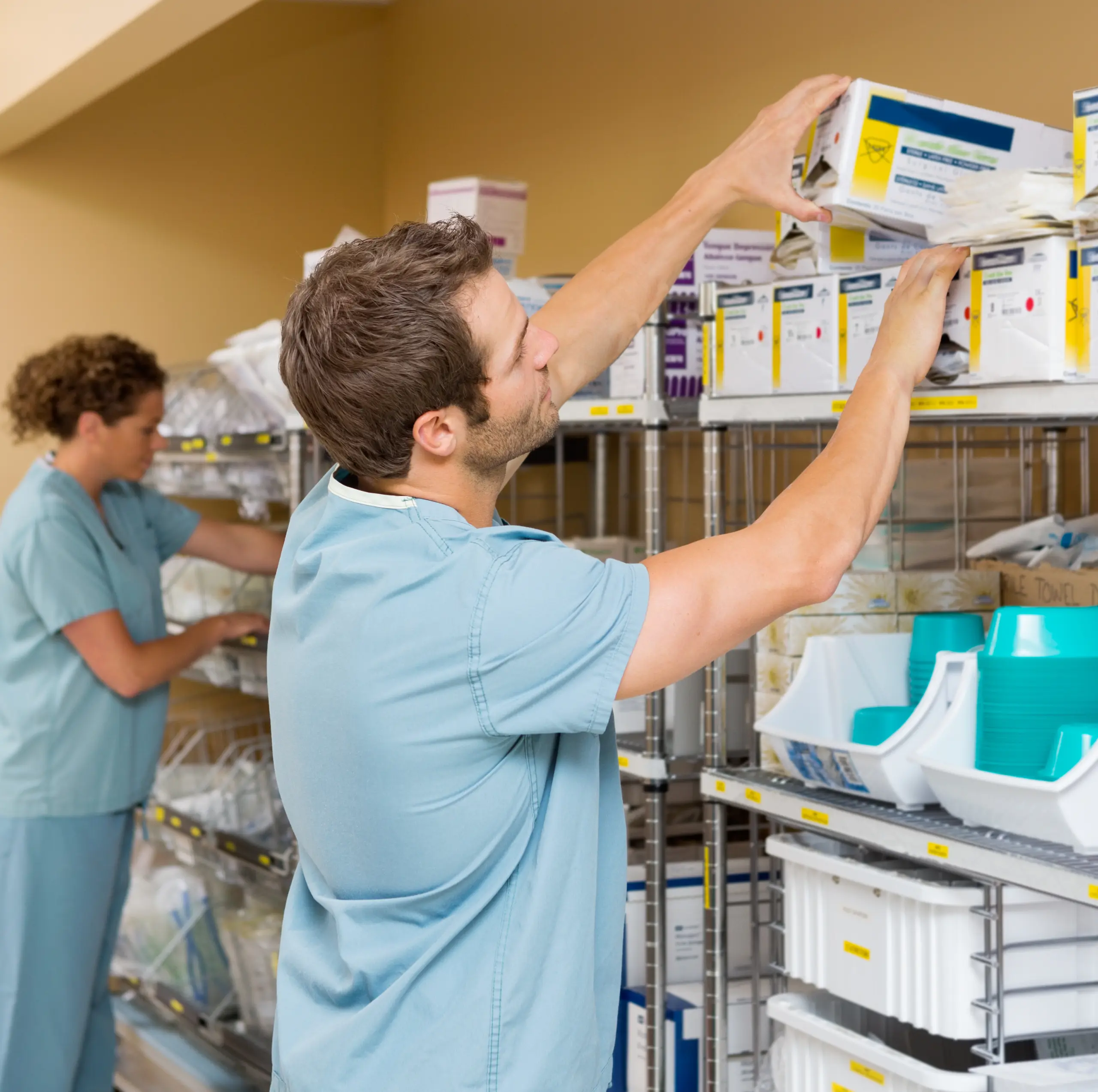 medical professionals searching supply closet