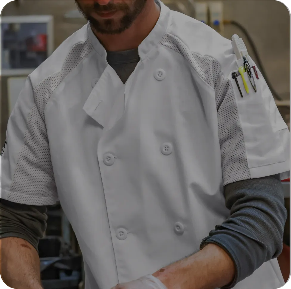 Person in a kitchen uniform